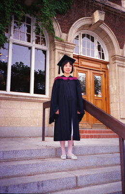 Photo of Sharon Master's graduation.